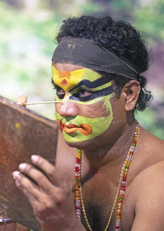 Kathakali performer or mime, 38 years old, makes up his face, Kochi Kathakali Centre, Kochi, Kerala, India, Asia