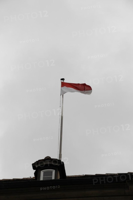 Langenburg Castle, A waving flag on a flagpole against a grey, cloudy sky, Langenburg Castle, Langenburg, Baden-Wuerttemberg, Germany, Europe