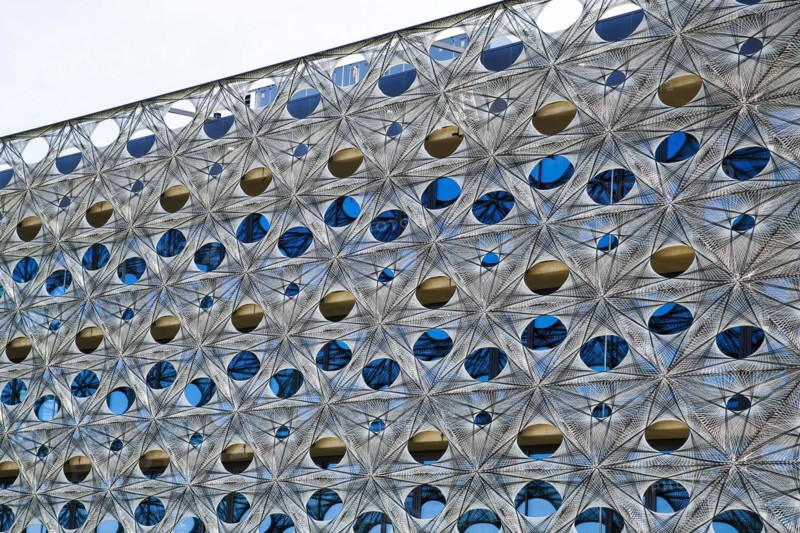 Reutlingen University, Reutlingen University, Texoversum, German University Building Award 2024 for TEXOVERSUM, modern architecture, facade made of carbon and glass fibres, mesh, innovative, identity-creating, unique facade, campus, place of learning, special, extraordinary new building for textile courses, light, airy, airy, holes, detail, architectural eye-catcher, Reutlingen, Baden-Wuerttemberg, Germany, Europe
