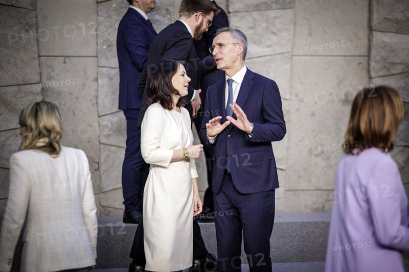 (L-R) Annalena Baerbock, Federal Foreign Minister, in conversation with Jens Stoltenberg, NATO Secretary General, at the family photo during the meeting of NATO foreign ministers. Brussels, 03.04.2024. Photographed on behalf of the Federal Foreign Office