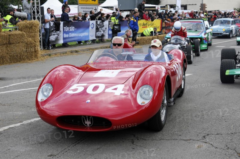 A red classic racing car with starting number 504 drives past spectators, SOLITUDE REVIVAL 2011, Stuttgart, Baden-Wuerttemberg, Germany, Europe