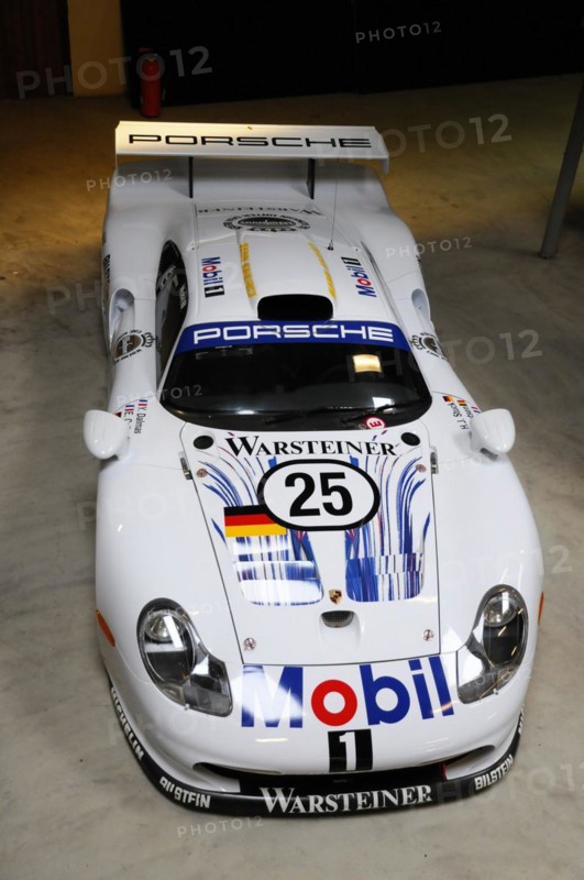 Deutsches Automuseum Langenburg, White Porsche 911 racing car with Mobil1 and Warsteiner advertising in the museum, Deutsches Automuseum Langenburg, Langenburg, Baden-Wuerttemberg, Germany, Europe