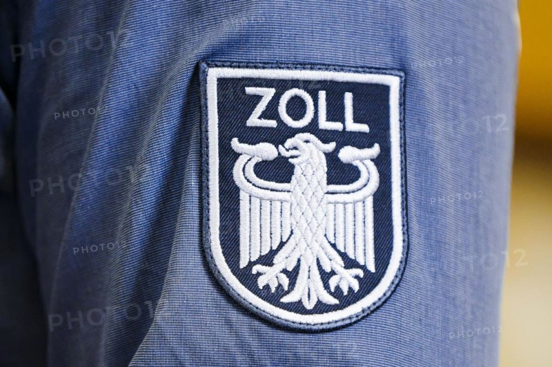 Customs logo on the shirt of a customs officer. Berlin, 03.04.2024