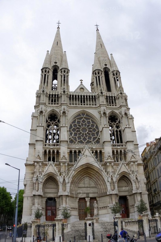 Church of Saint-Vincent-de-Paul, A Gothic church with twin towers rises in an urban setting, Marseille, Departement Bouches-du-Rhone, Provence-Alpes-Cote d'Azur region, France, Europe