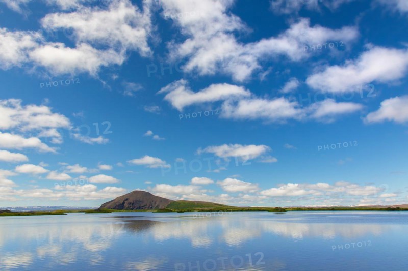 View over the shallow lake Myvatn in summer, Norourland eystra, Nordurland eystra in the north of Iceland