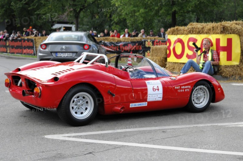 Rear view of a red Fiat Abarth racing car on a race track with straw bales, SOLITUDE REVIVAL 2011, Stuttgart, Baden-Wuerttemberg, Germany, Europe