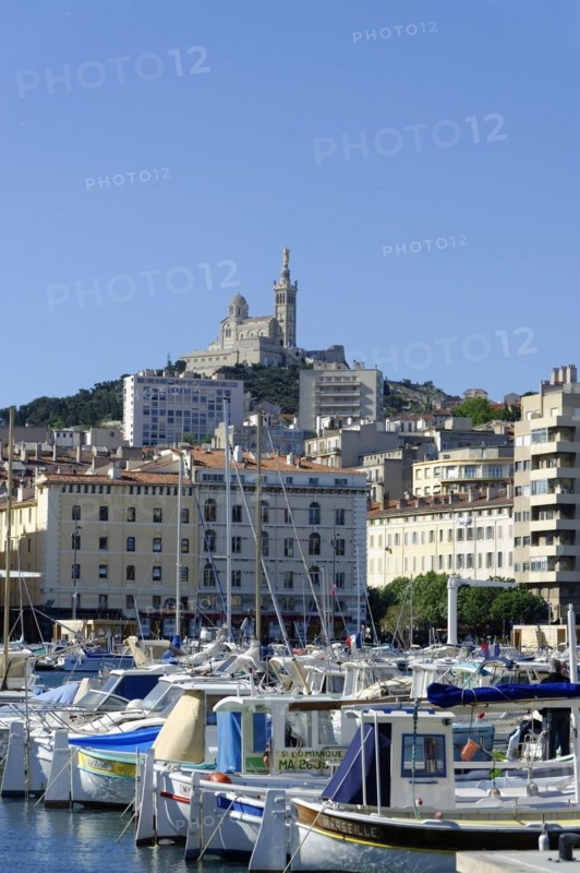 The old harbour, Vieux Port, behind the basilica Notre-Dame de la Garde, Marseille, A view of the old harbour of Marseille with the church in the background, Marseille, Departement Bouches du Rhone, Region Provence Alpes Cote d'Azur, France, Europe