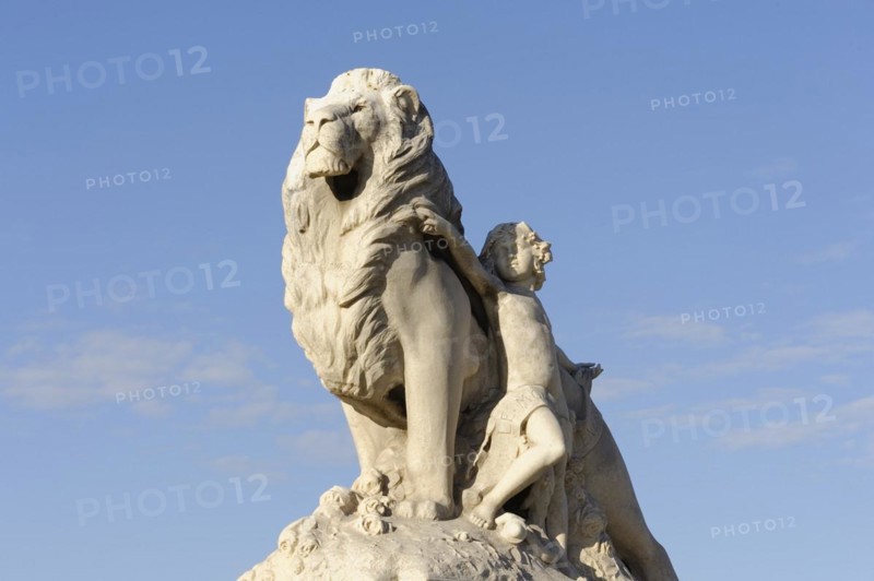 Marseille, White marble sculpture of a lion and a woman in front of a blue sky, Marseille, Departement Bouches-du-Rhone, Provence-Alpes-Cote d'Azur region, France, Europe