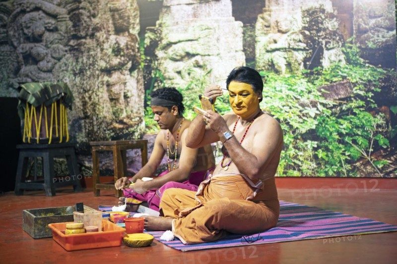 Kathakali performers or mime artists, 38 and 60 years old, make up their faces, Kochi Kathakali Centre, Kochi, Kerala, India, Asia
