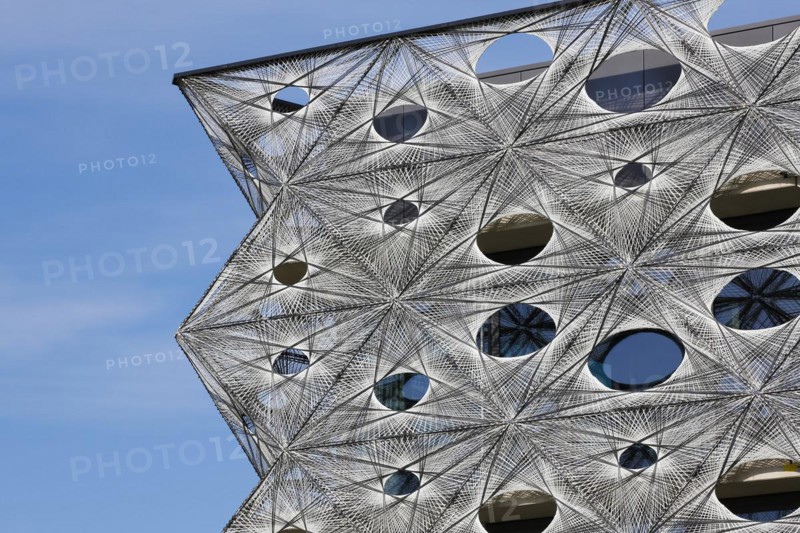 Reutlingen University, Reutlingen University, Texoversum, German University Building Award 2024 for TEXOVERSUM, modern architecture, facade made of carbon and glass fibres, mesh, innovative, identity-creating, unique facade, campus, place of learning, special, extraordinary new building for textile courses, light, airy, airy, holes, detail, architectural eye-catcher, Reutlingen, Baden-Wuerttemberg, Germany, Europe