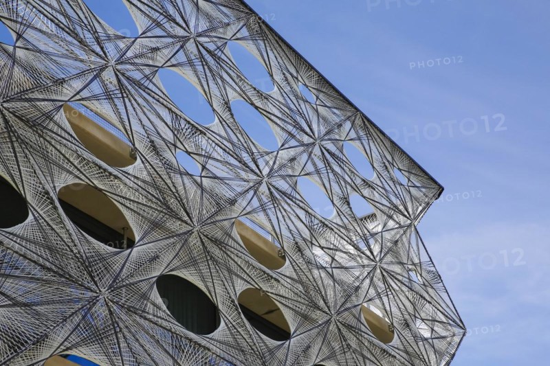 Reutlingen University, Reutlingen University, Texoversum, German University Building Award 2024 for TEXOVERSUM, modern architecture, facade made of carbon and glass fibres, mesh, innovative, identity-creating, unique facade, campus, place of learning, special, extraordinary new building for textile courses, light, airy, airy, holes, detail, architectural eye-catcher, Reutlingen, Baden-Wuerttemberg, Germany, Europe