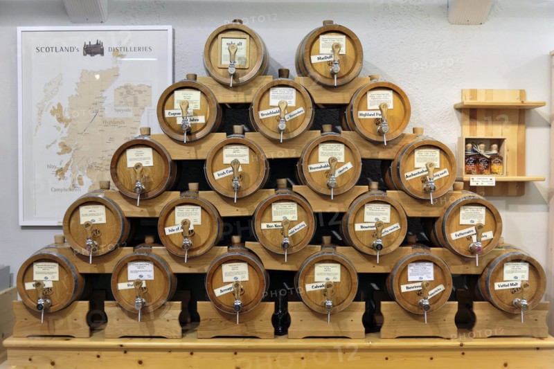 Wuerzburg, row of whisky casks with labels in a distilling environment, Wuerzburg, Lower Franconia, Bavaria, Germany, Europe