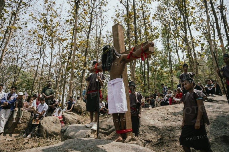 Christian devotees takes part in a perform to re-enactment of the crucifixion of Jesus Christ during a procession on Good Friday, on March 29, 2024 in Guwahati, Assam, India. Good Friday is a Christian holiday commemorating the crucifixion of Jesus Christ and his death at Calvary