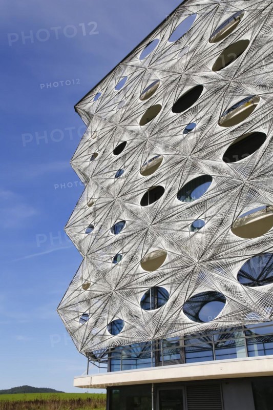 Reutlingen University, Reutlingen University, Texoversum, German University Building Award 2024 for TEXOVERSUM, modern architecture, facade made of carbon and glass fibres, mesh, innovative, identity-creating, unique facade, campus, place of learning, special, extraordinary new building for textile courses, light, airy, airy, holes, detail, architectural eye-catcher, Reutlingen, Baden-Wuerttemberg, Germany, Europe