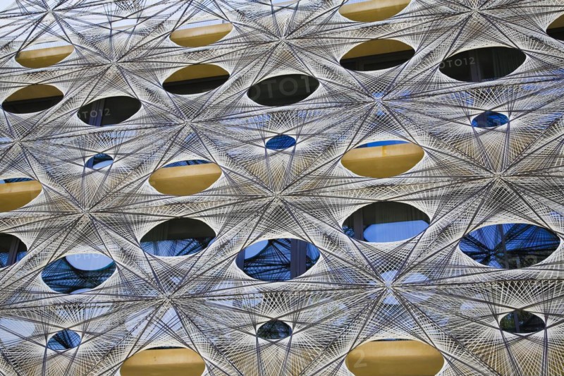Reutlingen University, Reutlingen University, Texoversum, German University Building Award 2024 for TEXOVERSUM, modern architecture, facade made of carbon and glass fibres, mesh, innovative, identity-creating, unique facade, campus, place of learning, special, extraordinary new building for textile courses, light, airy, airy, holes, detail, architectural eye-catcher, Reutlingen, Baden-Wuerttemberg, Germany, Europe
