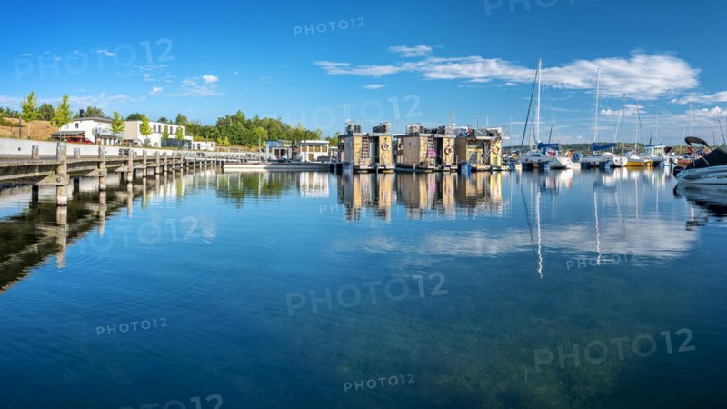 Holiday homes, sailing boats and houseboats in the harbour, Marina Braunsbedra, Geiseltalsee, Saxony-Anhalt, Germany, Europe