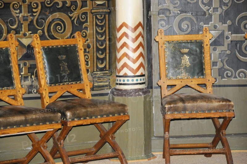 Langenburg Castle, Wooden chairs with leather seats and golden ornaments in a historic interior, Langenburg Castle, Langenburg, Baden-Wuerttemberg, Germany, Europe