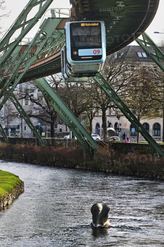 Suspension railway and sculpture by Bernd Bergkemper in the river Wupper commemorating the jump of the elephant Tuffi, Wuppertal, Germany, Europe