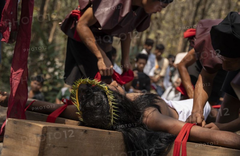 Christian devotees takes part in a perform to re-enactment of the crucifixion of Jesus Christ during a procession on Good Friday, on March 29, 2024 in Guwahati, Assam, India. Good Friday is a Christian holiday commemorating the crucifixion of Jesus Christ and his death at Calvary