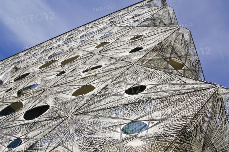 Reutlingen University, Reutlingen University, Texoversum, German University Building Award 2024 for TEXOVERSUM, modern architecture, facade made of carbon and glass fibres, mesh, innovative, identity-creating, unique facade, campus, place of learning, special, extraordinary new building for textile courses, light, airy, airy, holes, detail, architectural eye-catcher, Reutlingen, Baden-Wuerttemberg, Germany, Europe
