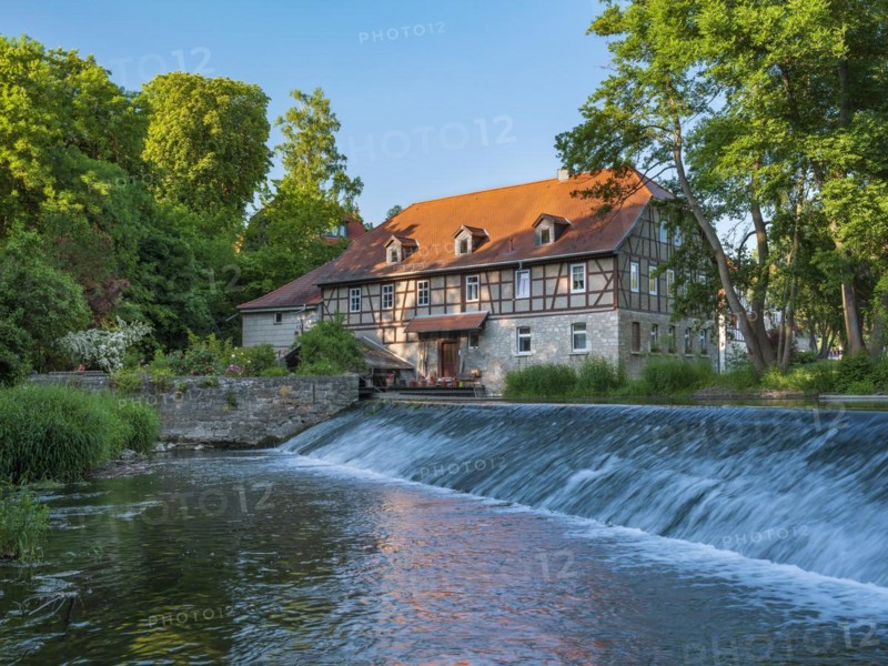 The watermill of Taubach on the river Ilm with weir, oldest mill in Thuringia, Weimar, Thuringia, Germany, Europe