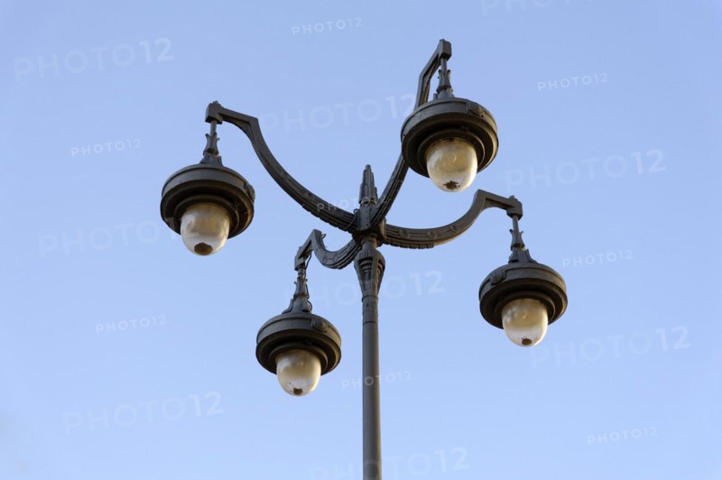 Historic-looking quadruple street lamp against a clear sky, Marseille, Departement Bouches-du-Rhone, Provence-Alpes-Cote d'Azur region, France, Europe