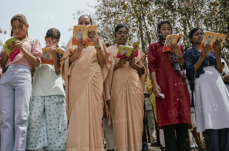 Christian devotees takes part in a perform to re-enactment of the crucifixion of Jesus Christ during a procession on Good Friday, on March 29, 2024 in Guwahati, Assam, India. Good Friday is a Christian holiday commemorating the crucifixion of Jesus Christ and his death at Calvary