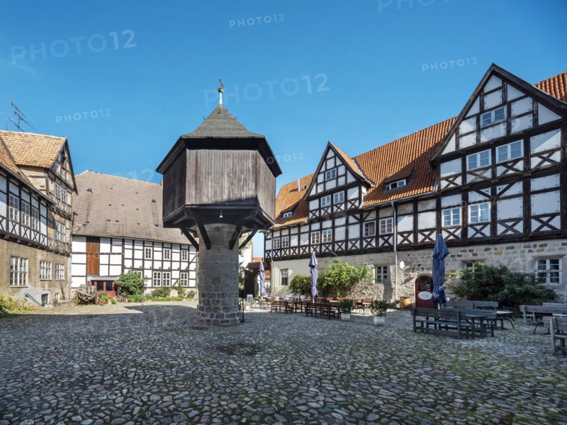 Half-timbered houses and dovecote in the Quedlinburg Adelshof in the historic old town, UNESCO World Heritage Site, Quedlinburg, Saxony-Anhalt, Germany, Europe