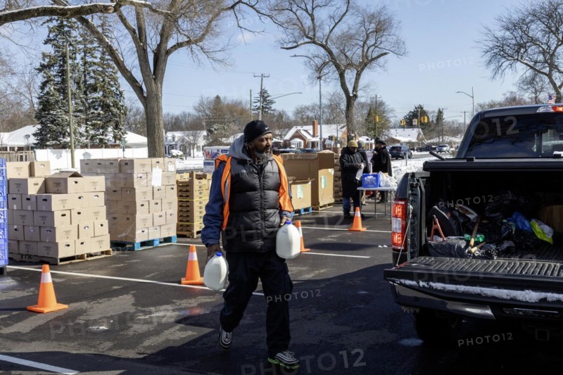 Detroit, Michigan, Free food is distributed to people attending a community health fair