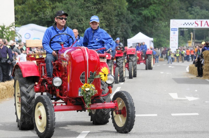 Porsche diesel tractors, drivers in red vintage tractors take part in a rally, SOLITUDE REVIVAL 2011, Stuttgart, Baden-Wuerttemberg, Germany, Europe