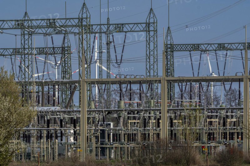Stendal West substation with wind turbines in the background near Luederitz, Stendal, Saxony-Anhalt, Germany, Europe