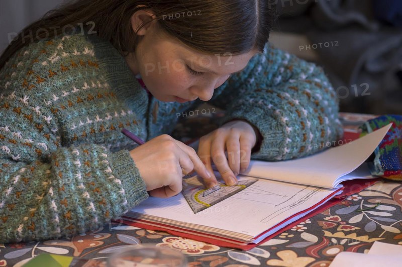 Girl, 10 years old, doing schoolwork, Mecklenburg-Western Pomerania, Germany, Europe