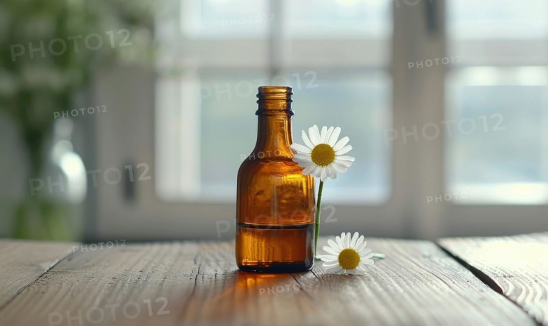 Chamomile essential oil in a dropper bottle, closeup view, skin care cosmetic background AI generated