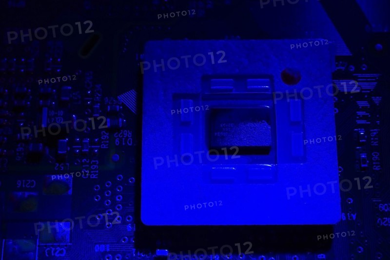 Close-up of blue lighted microchip on electronic computer circuit board, Studio Composition, Quebec, Canada, North America