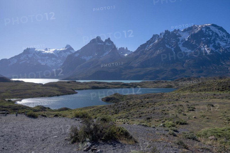 Lago Pehoe, mountain range of the Andes, backlight, Torres del Paine National Park, Parque Nacional Torres del Paine, Cordillera del Paine, towers of the blue sky, Region de Magallanes y de la Antartica Chilena, Ultima Esperanza province, UNESCO biosphere reserve, Patagonia, end of the world, Chile, South America