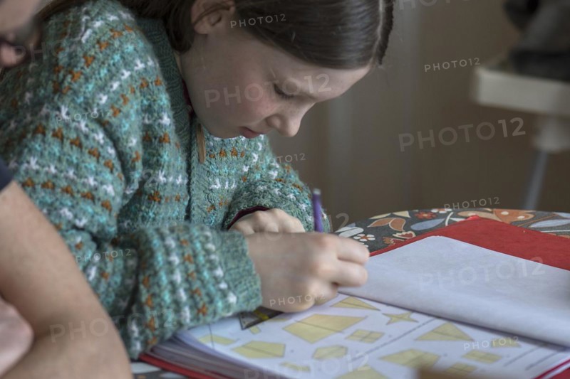 Girl, 10 years old, doing schoolwork, Mecklenburg-Western Pomerania, Germany, Europe