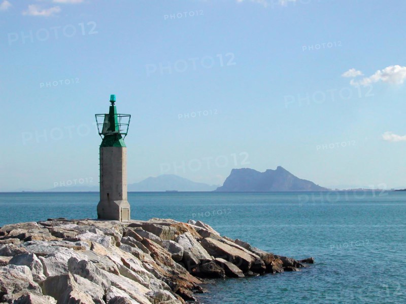 Lighthouse with View over Gibraltar and African Coast in Morocco in Mediterranean Sea in a Sunny Day in Sotogrande, Cadiz, Spain, Europe