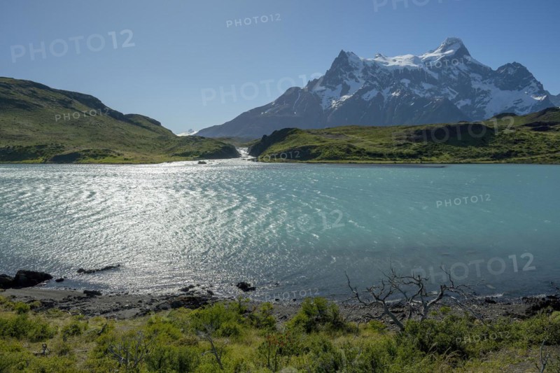 Waterfall, Lago Pehoe, mountain range of the Andes, Torres del Paine National Park, Parque Nacional Torres del Paine, Cordillera del Paine, Towers of the Blue Sky, Region de Magallanes y de la Antartica Chilena, Ultima Esperanza province, UNESCO biosphere reserve, Patagonia, end of the world, Chile, South America