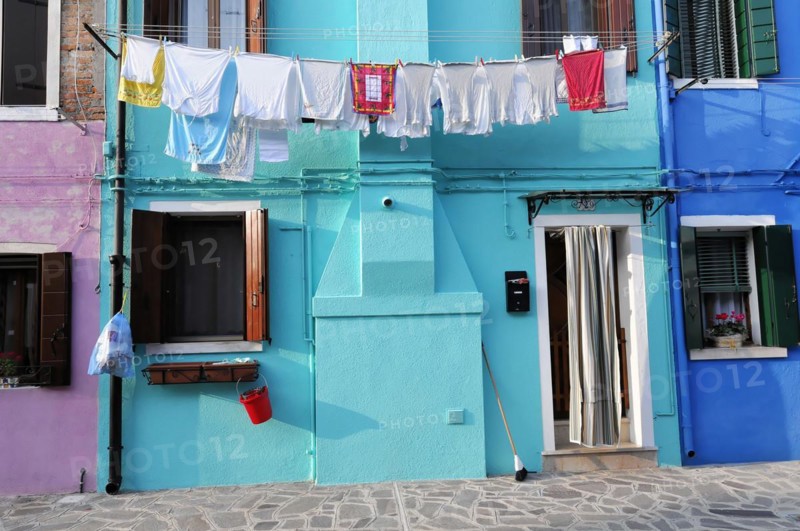 Colourful houses, Burano, Burano Island, Traditional everyday life with laundry drying on a colourful house facade, Burano, Venice, Veneto, Italy, Europe