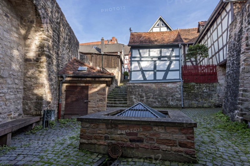 Historic town fountain at the Schelmenpforte on the town wall, 11th century, cultural monument, listed building, old town, Ortenberg, Vogelsberg, Wetterau, Hesse, Germany, Europe