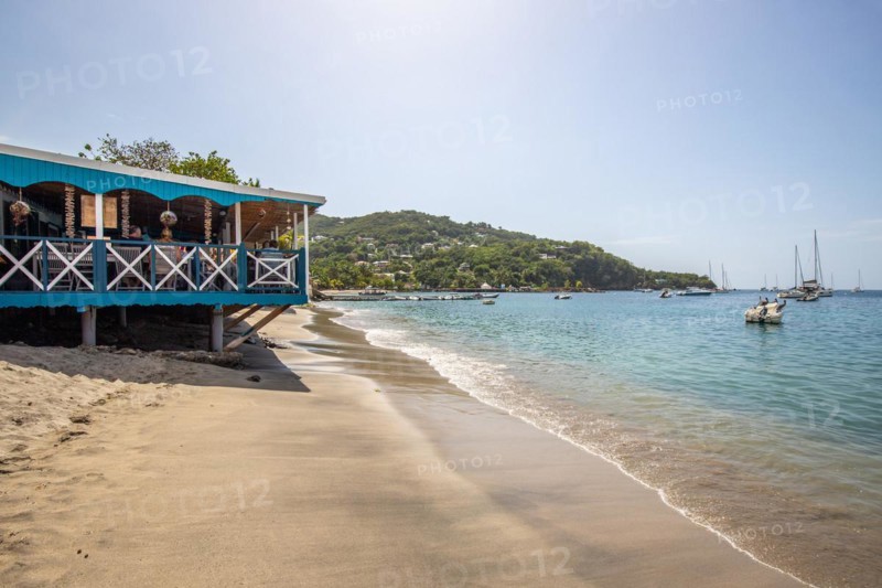 A beach in the Caribbean on the Atlantic coast in Deshaies, Guadeloupe, French Antilles, North America