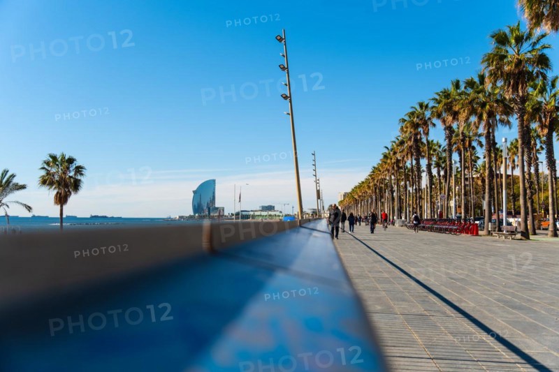 Promenade with joggers on the beach in Barcelona, Spain, Europe
