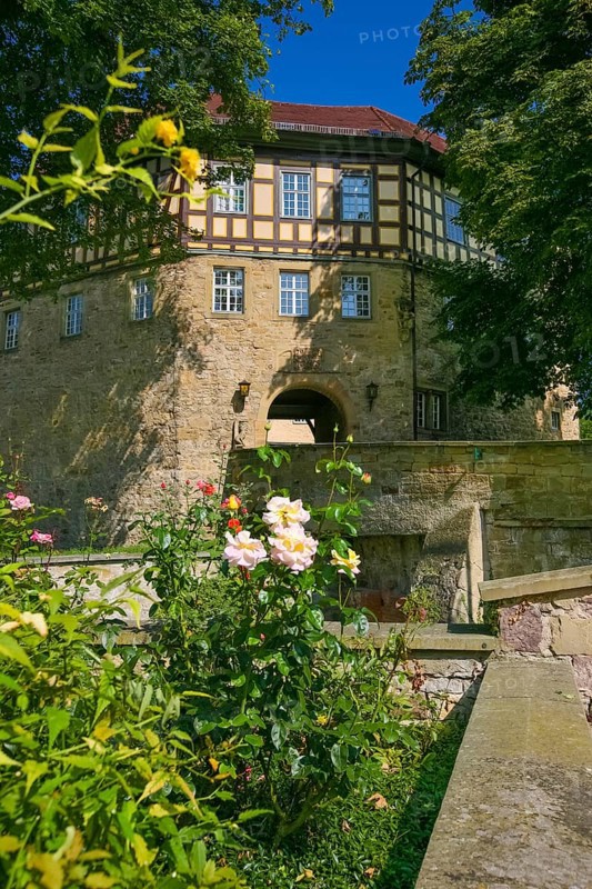 Access to the moated castle Sachsenheim, Grosssachsenheim Castle, former moated castle, archway, wall, bridge, passage, coat of arms, with inscription, exterior lights, lamps, architecture, historic building from the 15th century, Sachsenheim, Ludwigsburg district, Baden-Wuerttemberg, Germany, Europe