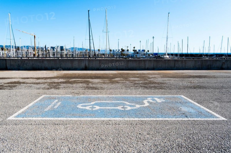 Parking space for an electric car on the beach in Barcelona, Spain, Europe