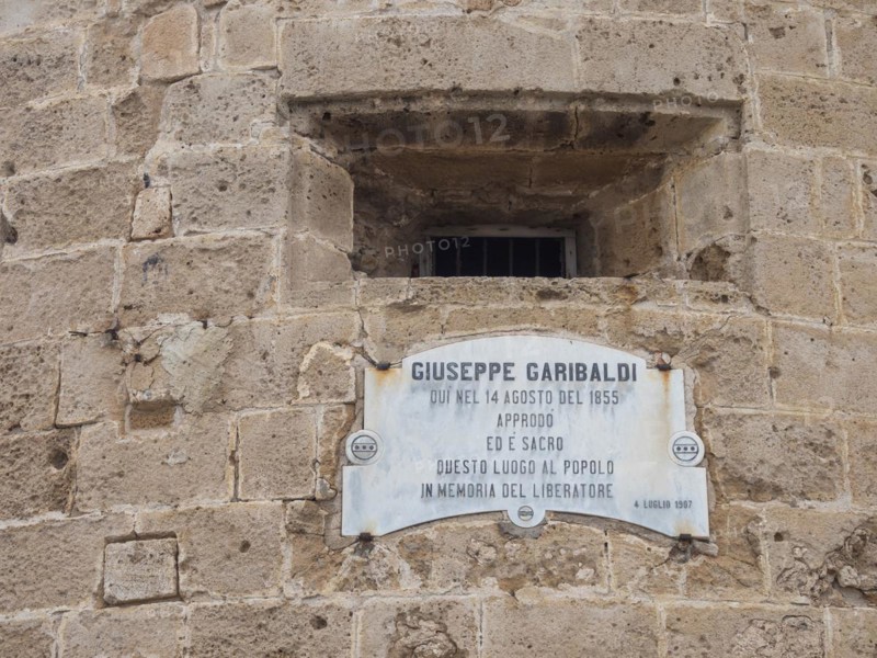 Plaque dedicated to Guiseppe Garibaldi at the Torre di Garibaldi, tower of the fortress, Alghero, Sardinia, Italy, Europe