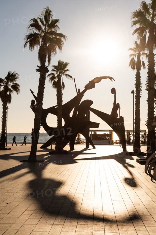 Sculpture with athletes on the beach in Barcelona, Spain, Europe