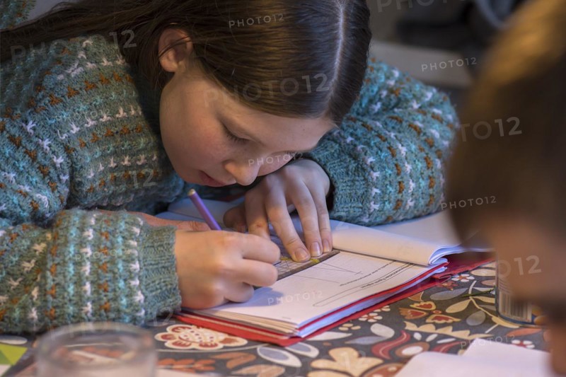 Girl, 10 years old, doing schoolwork, Mecklenburg-Western Pomerania, Germany, Europe