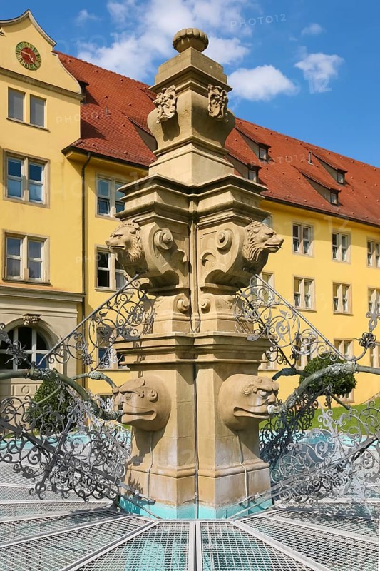 Fountain with lion heads, stone figures, Winnental Castle built in the 15th century by the Teutonic Knights as the seat of the Winnender Kommende, former castle of the Teutonic Order, today Winnenden Castle Clinic Centre for Psychiatry, castle building, historical building, architecture, castle park, Winnenden, Rems-Murr-Kreis, Baden-Wuerttemberg, Germany, Europe