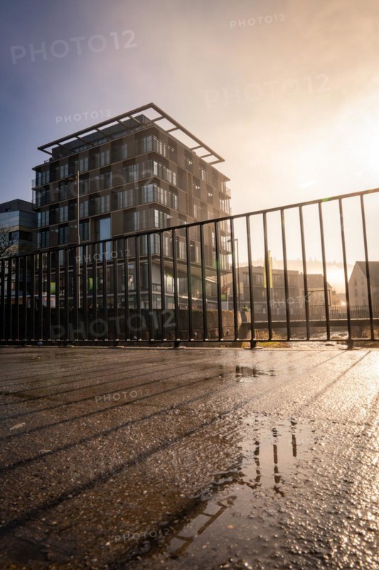Ibis Styles Hotel, Modern architecture with reflection in a puddle, captured in daylight, sunrise, Nagold, Black Forest, Germany, Europe