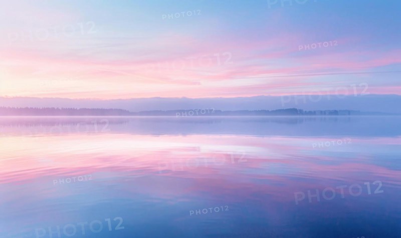 The soft pastel colors of dawn breaking over the horizon AI generated